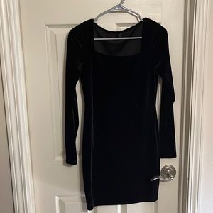 Size large long sleeve black velvet mini dress. Fit is closer to medium